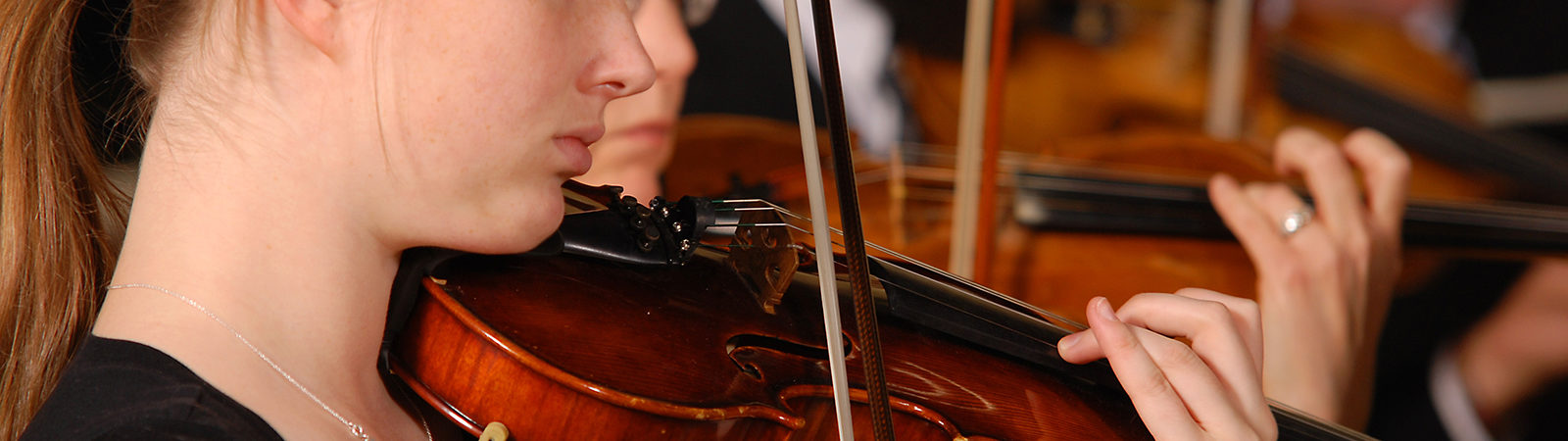Student playing violin