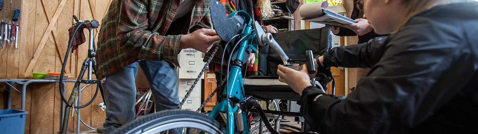 Students working on handcycle