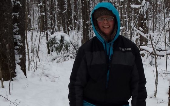 Northland College student tracking wolves