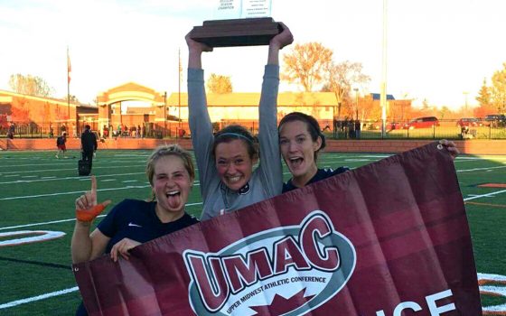 Women's soccer celebrating their UMAC conference title