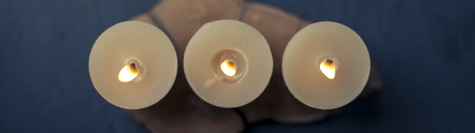 Three candles burning