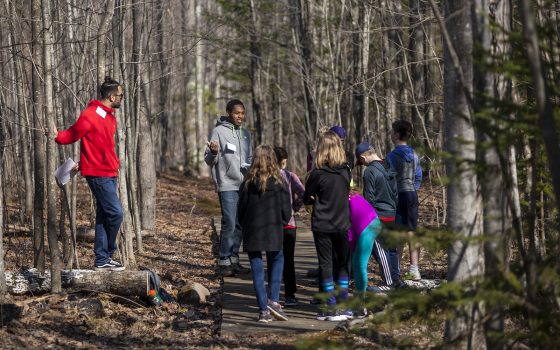 Northland College teaching students talk with Washburn fifth graders