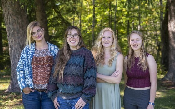 Four eco-rep students outdoors