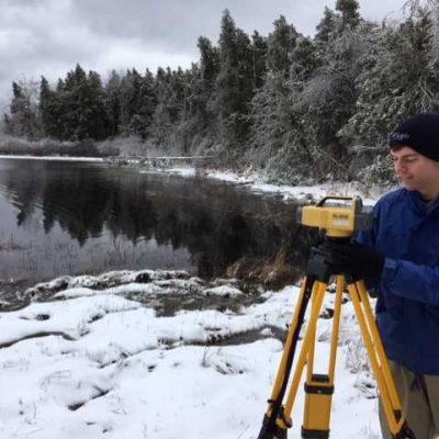 Northland College student surveys Fish Creek.