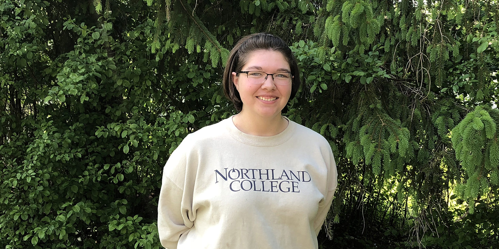 Northland College student outside.