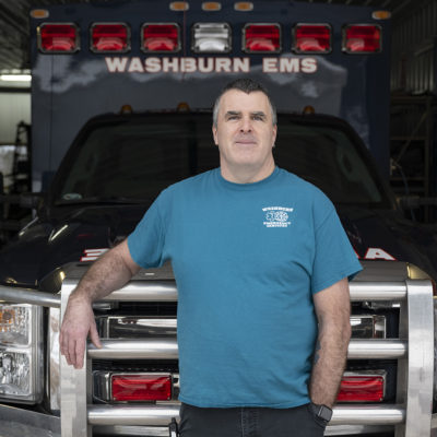 Alum Andy Okey at work at ambulance hall.