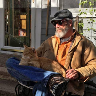 Retired professor Tim Doyle at home.