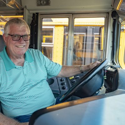 Northland alum Jim Quinn drives school bus for kids during the pandemic.