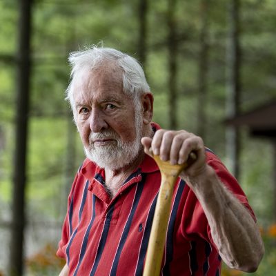 Portrait of Roger Dreher with canoe paddle.