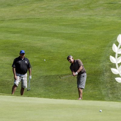 2022 Annual Golf Classic - image of golpher chipping the ball up onto a green