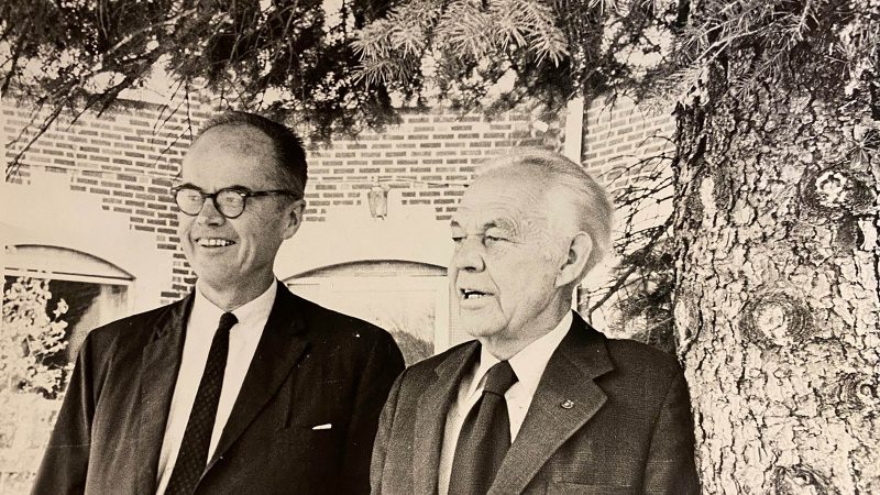 Sigurd Olson and Robert Matteson stand in front of Memorial Hall