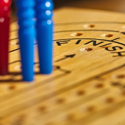 Pegs on a cribbage board.